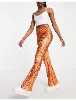 velvet flare pant in rust floral print