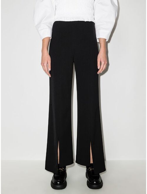 GANNI asymmetric hem high-waisted trousers