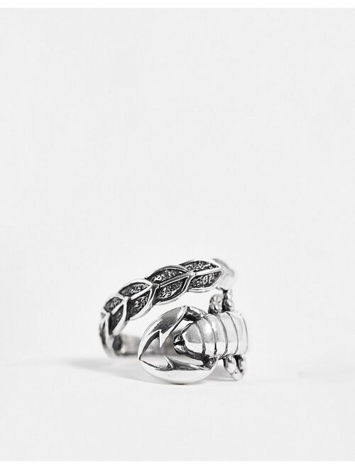 ASOS DESIGN sterling silver ring with wraparound scorpion in burnished silver