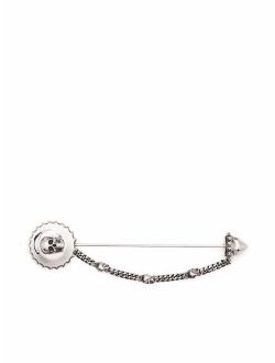 skull charm brooch