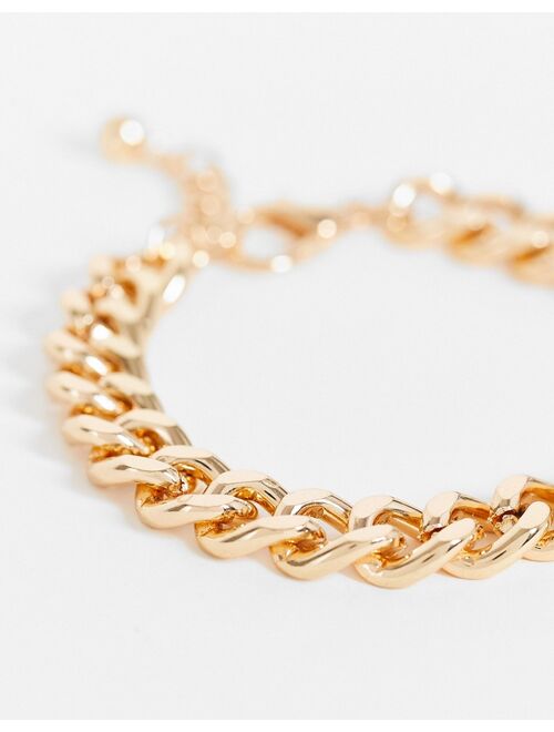 ASOS DESIGN 2 pack bracelet set with curb and figaro chains in gold tone