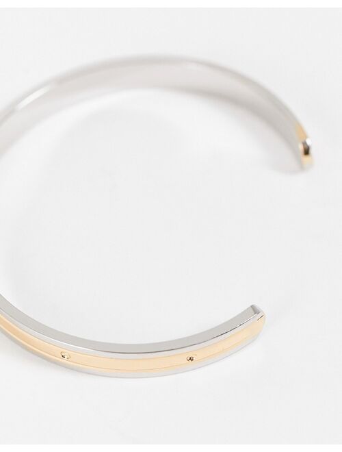 ASOS DESIGN cuff bracelet in mixed biplate silver and gold tone