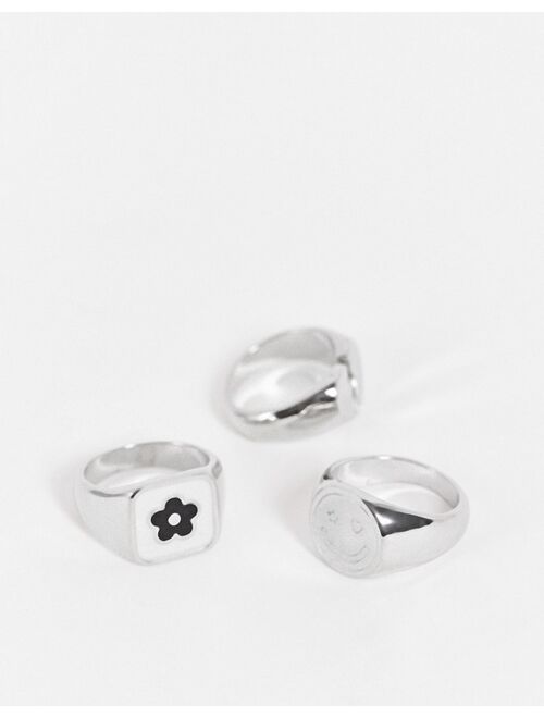 ASOS DESIGN 3 pack signet ring set with heart and flower design in silver tone