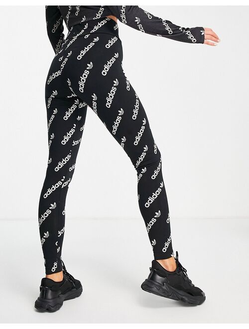 adidas Originals Logomania repeat logo leggings in black