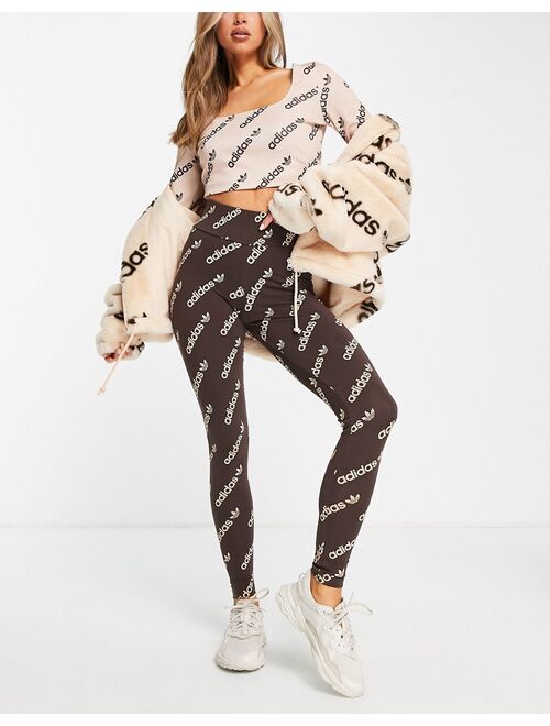 adidas Originals 'Logomania' repeat logo leggings in brown