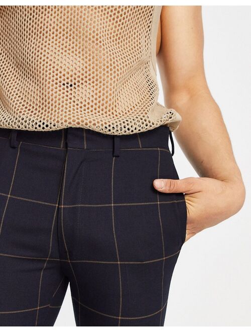 ASOS DESIGN skinny flared smart pants in navy and rust windowpane check