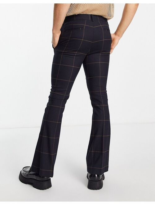 ASOS DESIGN skinny flared smart pants in navy and rust windowpane check