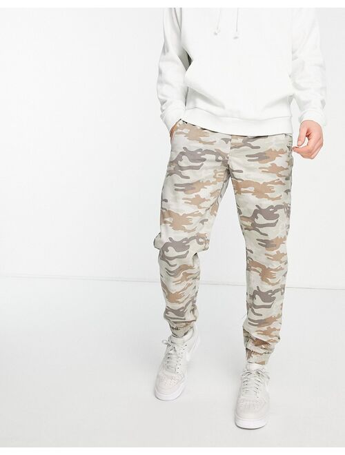 River Island zip pocket cargo pants in camo