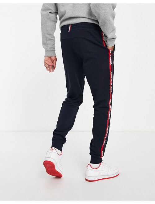 Tommy Hilfiger performance sweatpants with taping in navy