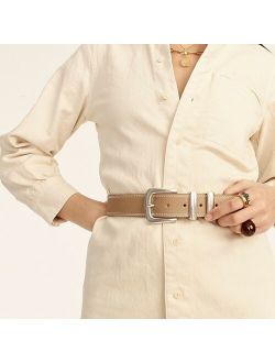 Leather belt with large gold buckle