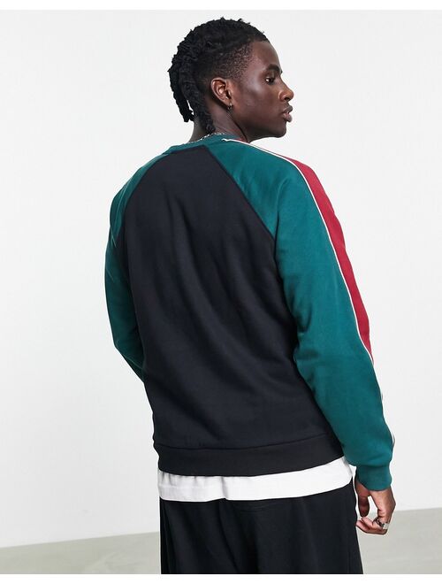 Fila colour blocked sweatshirt in black & green