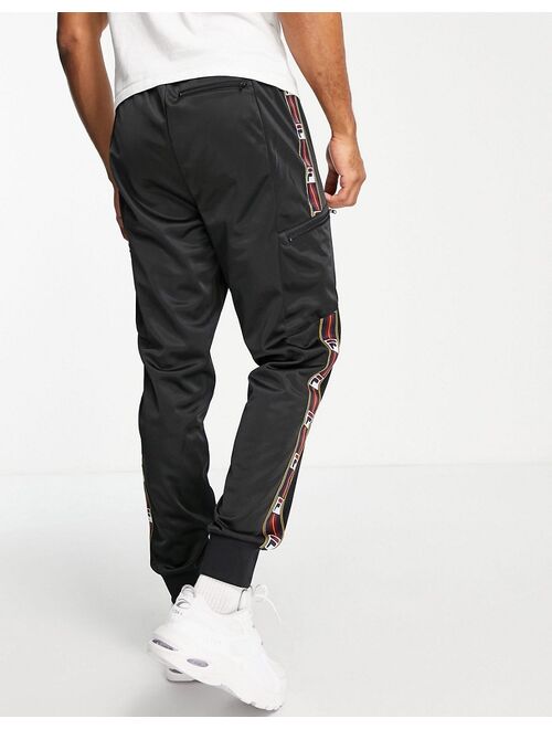 Fila sweatpants with taping in black