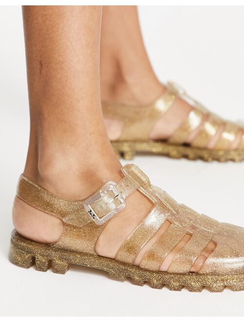 Juju jelly flat shoes in gold glitter