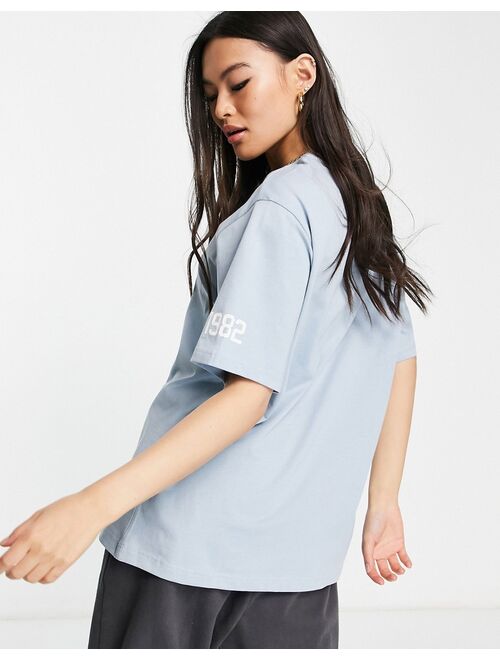 Reebok freestyle oversized t-shirt in baby blue