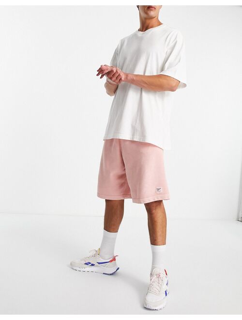 Reebok natural dye sweat shorts in pastel pink