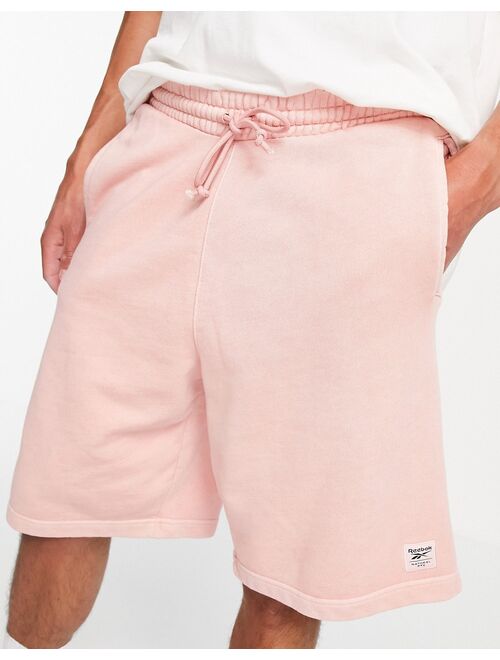 Reebok natural dye sweat shorts in pastel pink