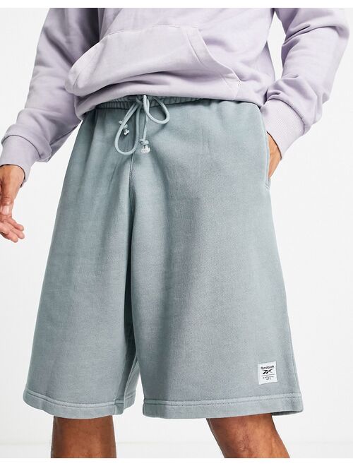 Reebok natural dye sweat shorts in powder blue