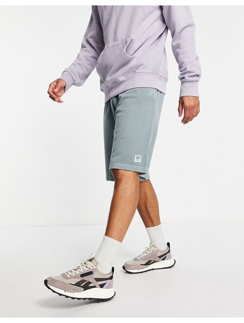 Reebok natural dye sweat shorts in powder blue