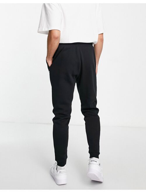 Reebok small logo sweatpants in black