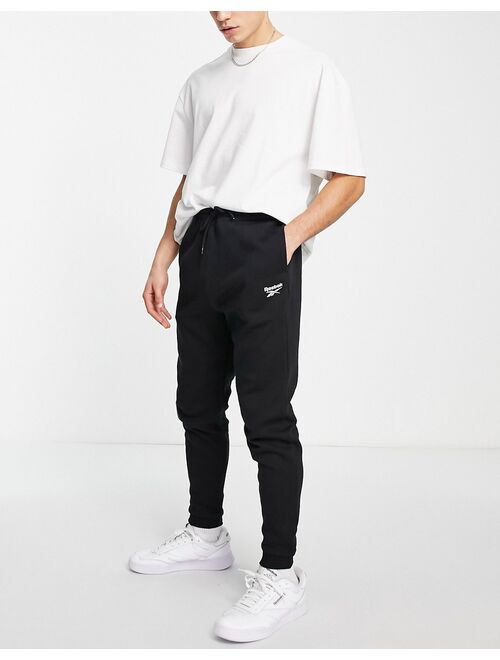 Reebok small logo sweatpants in black