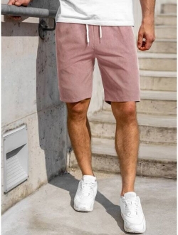 Men Solid Drawstring E-Waist Regular Fit Shorts