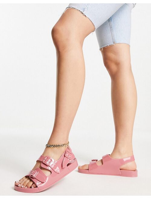 ASOS DESIGN Fate jelly flat sandals with buckles in rose