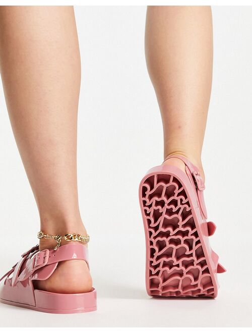 ASOS DESIGN Fate jelly flat sandals with buckles in rose