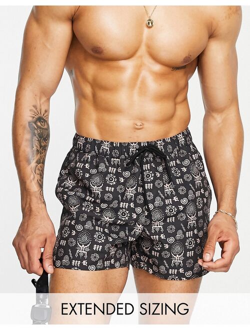 ASOS DESIGN swim shorts in black with HAND DRAWN design short length