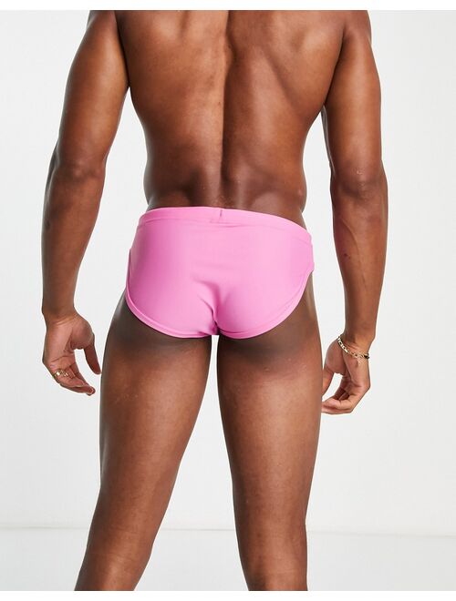 ASOS DESIGN swim briefs in bright pink with tie