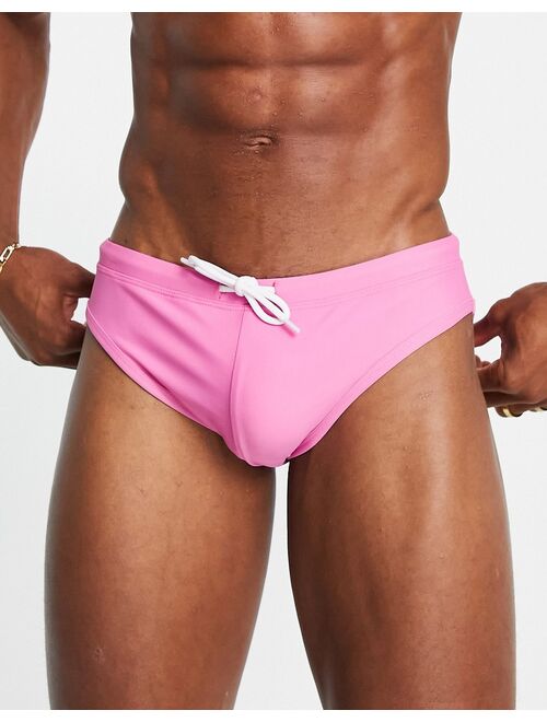 ASOS DESIGN swim briefs in bright pink with tie