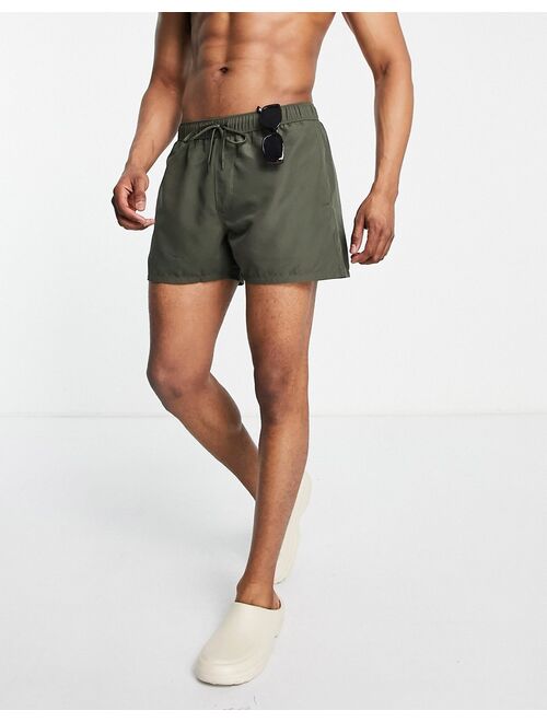 ASOS DESIGN swim shorts in khaki short length