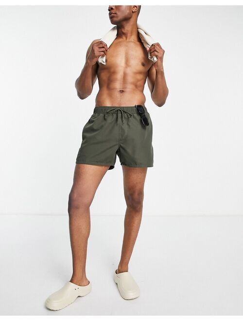 ASOS DESIGN swim shorts in khaki short length