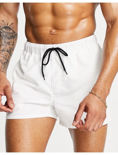 ASOS DESIGN swim shorts in white in short length