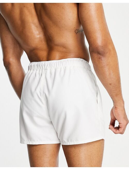 ASOS DESIGN swim shorts in white in short length