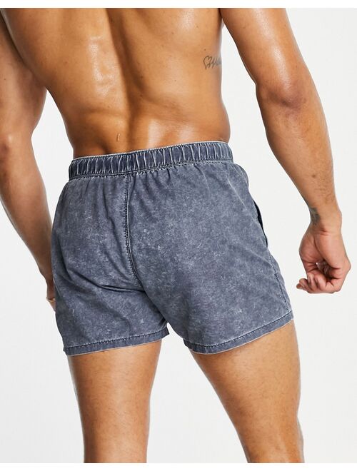 ASOS DESIGN swim shorts in short length navy acid wash