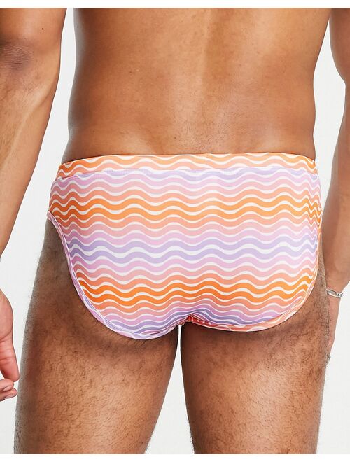 ASOS DESIGN swim briefs with wavy pastel stripe and tie front