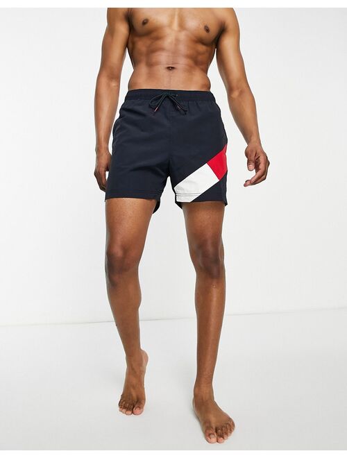 Tommy Hilfiger flag leg logo mid length swim shorts in navy