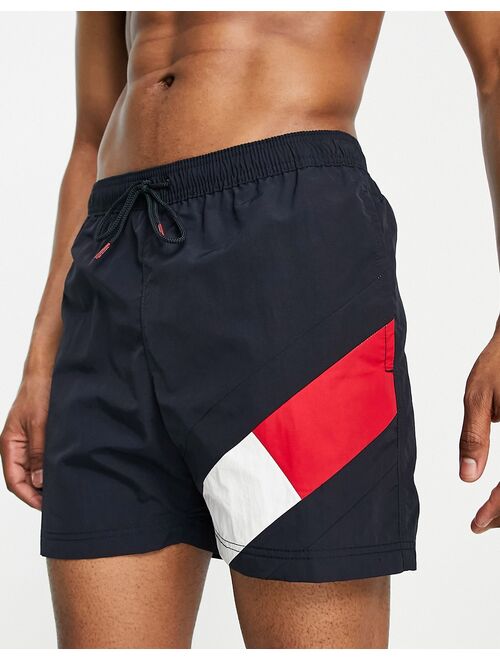 Tommy Hilfiger flag leg logo mid length swim shorts in navy