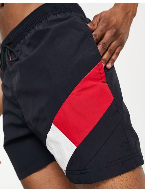 Tommy Hilfiger flag leg logo mid length swim shorts in navy