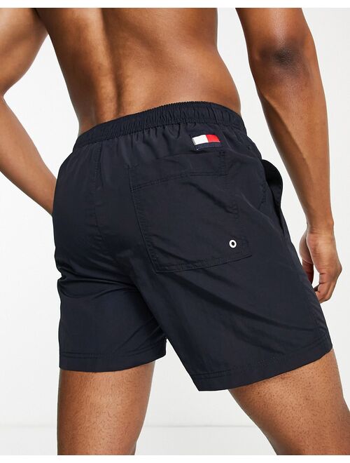 Tommy Hilfiger flag leg logo mid length swim shorts in navy