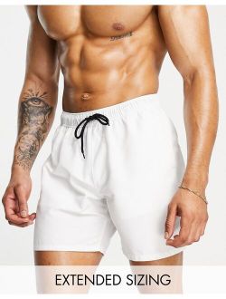 swim shorts in white in mid length