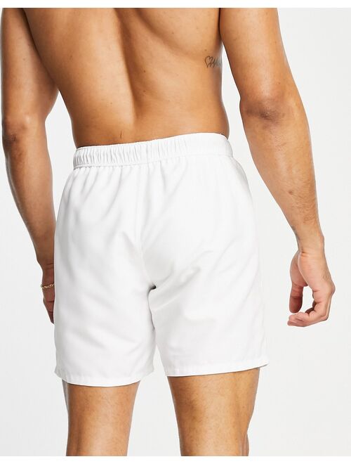 ASOS DESIGN swim shorts in white in mid length