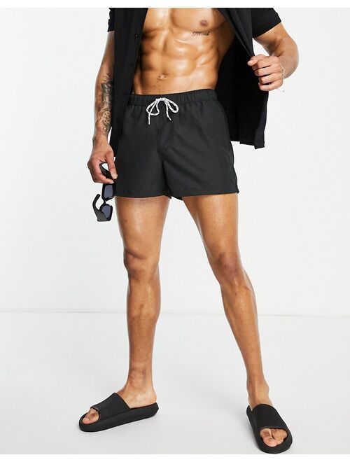 ASOS DESIGN swim shorts in black short length