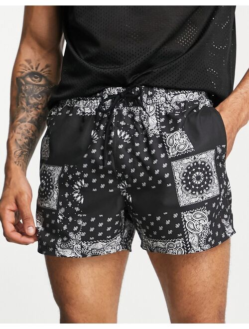 ASOS DESIGN swim shorts with black Bandanaprint short length