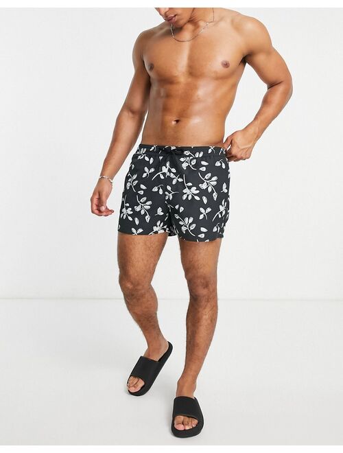 ASOS DESIGN swim shorts with scribble floral print in black short length