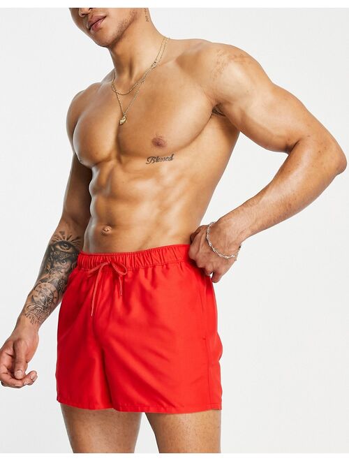 ASOS DESIGN short length swim shorts in red