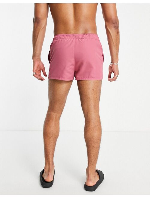 ASOS DESIGN swim shorts in berry pink super short length