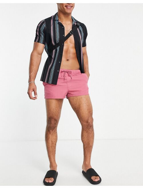 ASOS DESIGN swim shorts in berry pink super short length