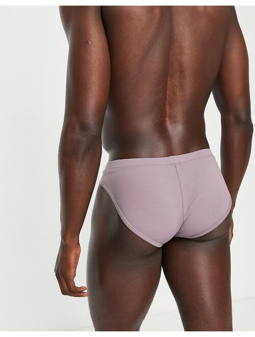 ASOS DESIGN swim briefs with textured rib in purple