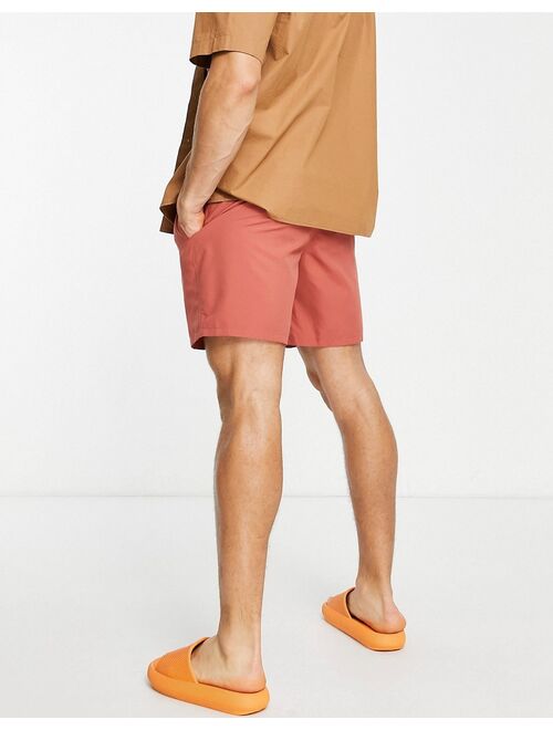 ASOS DESIGN swim shorts in rust red mid length